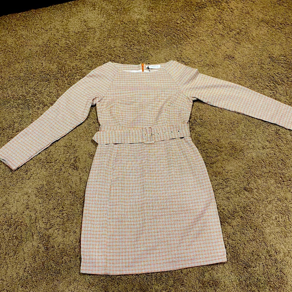 Long sleeve, form fitted dress with matching belt
